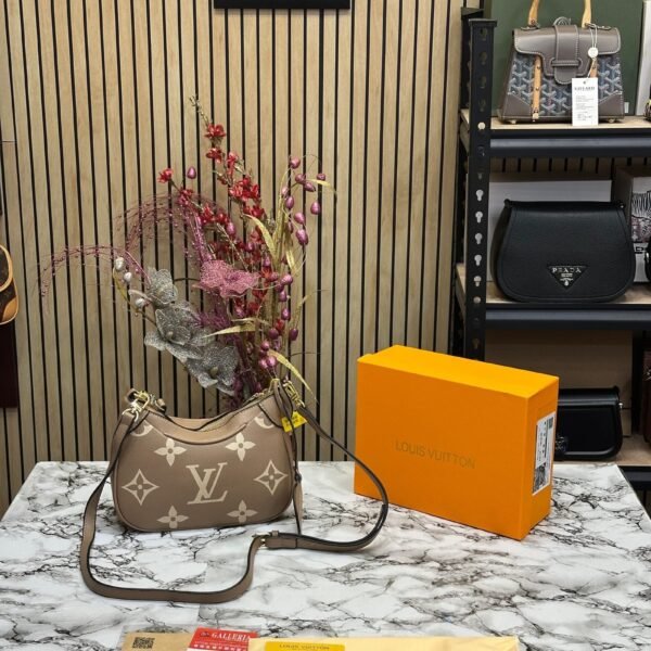 LOUIS VUITTON BICOLOR MONOGRAM EMPREINTE